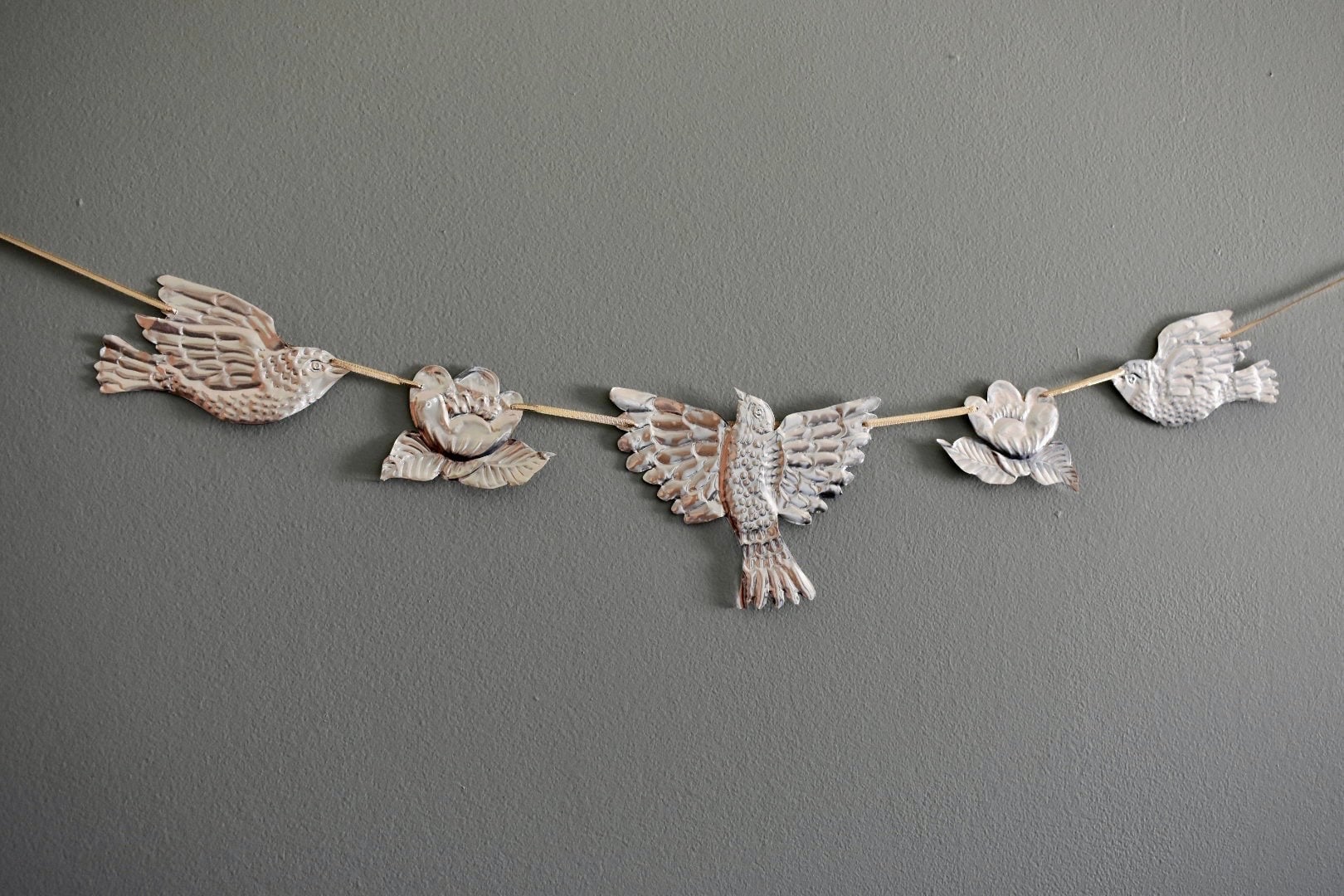 Embossed Tin Bird Garland - hand embossed metal flying bird and flower bunting - folk art tin birds wall banner