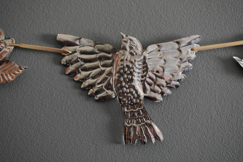 Embossed Tin Bird Garland - hand embossed metal flying bird and flower bunting - folk art tin birds wall banner