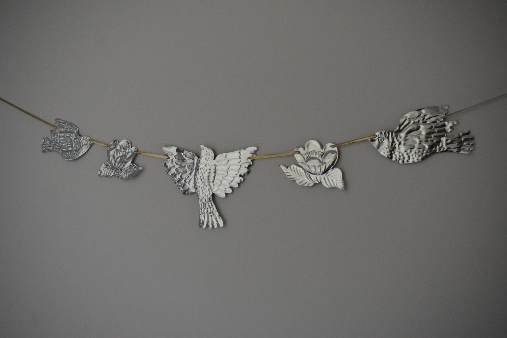 Embossed Tin Bird Garland - hand embossed metal flying bird and flower bunting - folk art tin birds wall banner