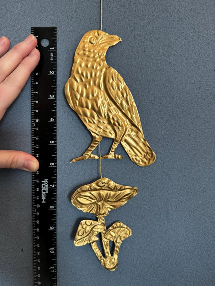 Embossed gold tin Crow and Mushrooms- hand pressed foil hanging decoration