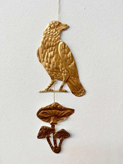 Embossed gold tin Crow and Mushrooms- hand pressed foil hanging decoration