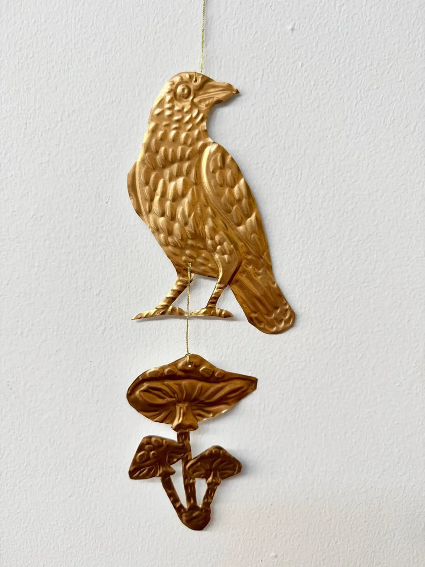 Embossed gold tin Crow and Mushrooms- hand pressed foil hanging decoration