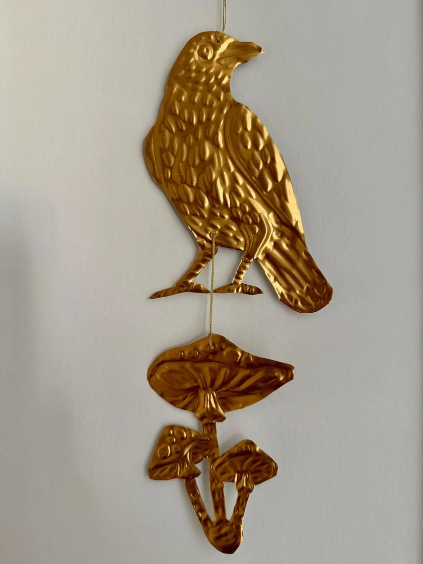 Embossed gold tin Crow and Mushrooms- hand pressed foil hanging decoration