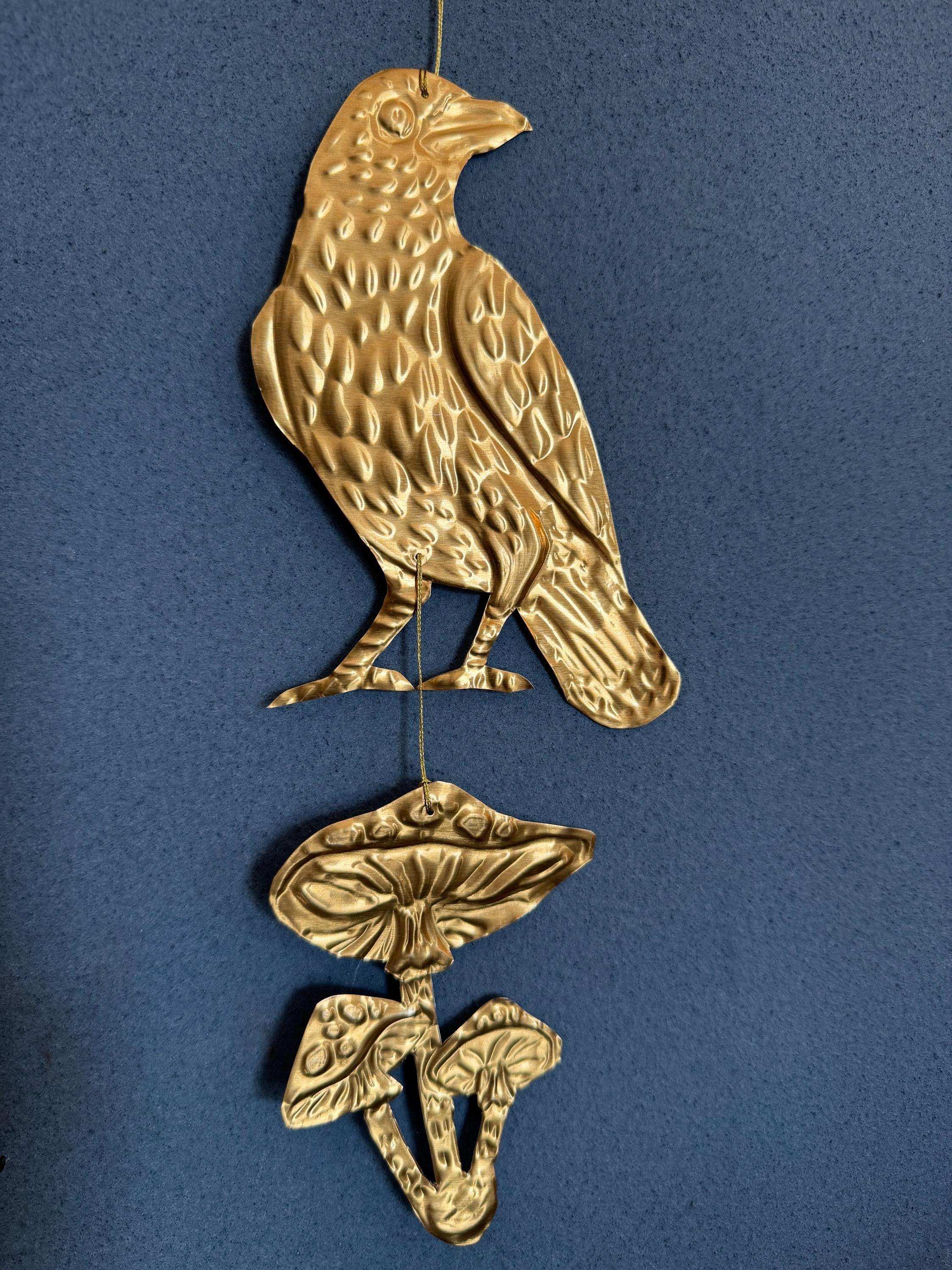 Embossed gold tin Crow and Mushrooms- hand pressed foil hanging decoration