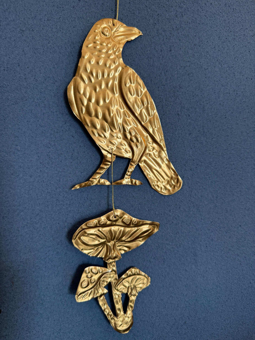 Embossed gold tin Crow and Mushrooms- hand pressed foil hanging decoration