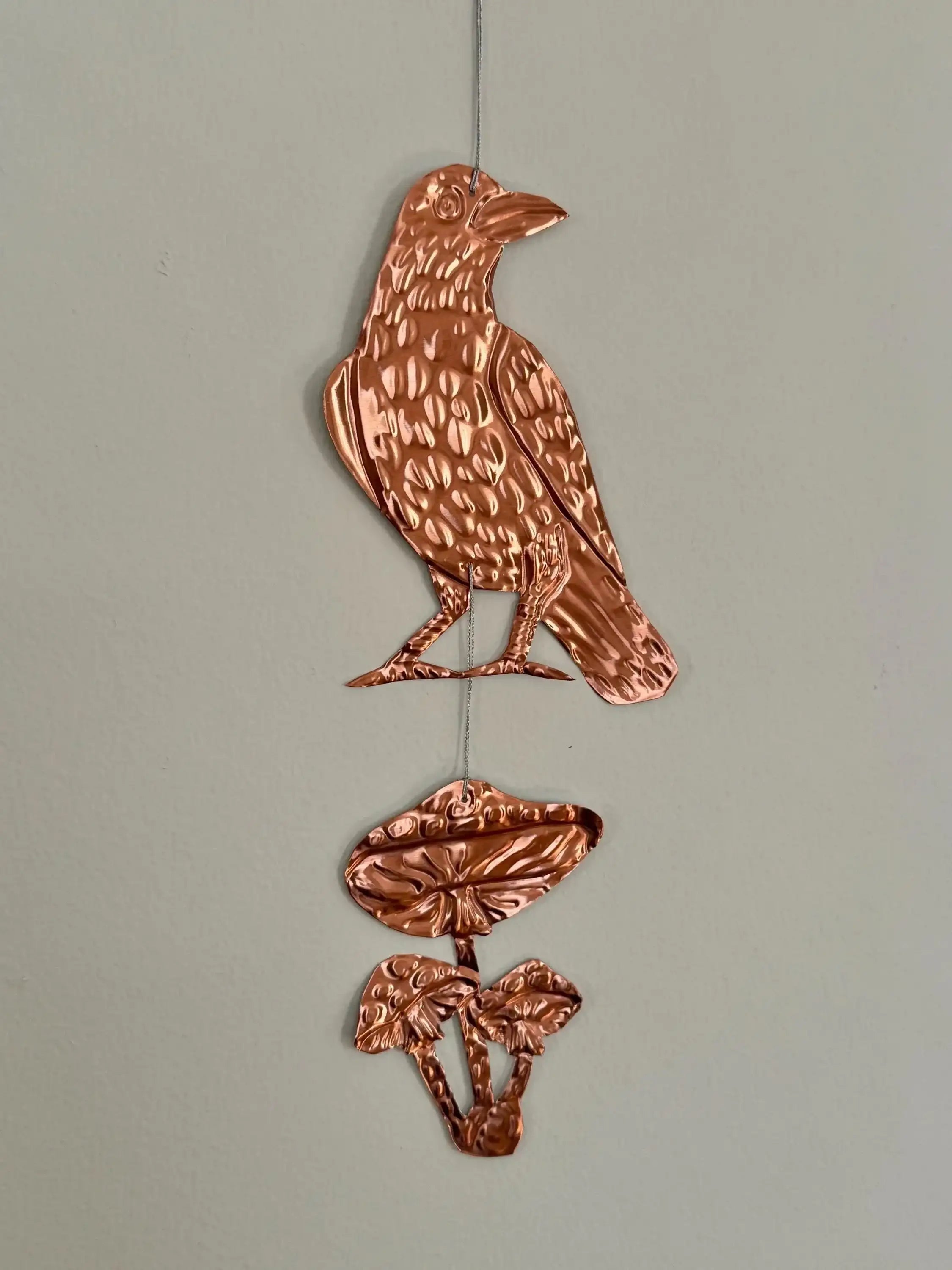 Embossed gold tin Crow and Mushrooms- hand pressed foil hanging decoration