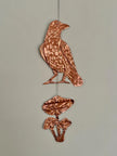 Embossed gold tin Crow and Mushrooms- hand pressed foil hanging decoration