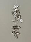 Embossed gold tin Crow and Mushrooms- hand pressed foil hanging decoration